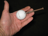 Hammered Nail into Golf Ball